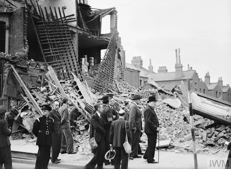 Winston Churchill visits bombed out buildings in the East End of London