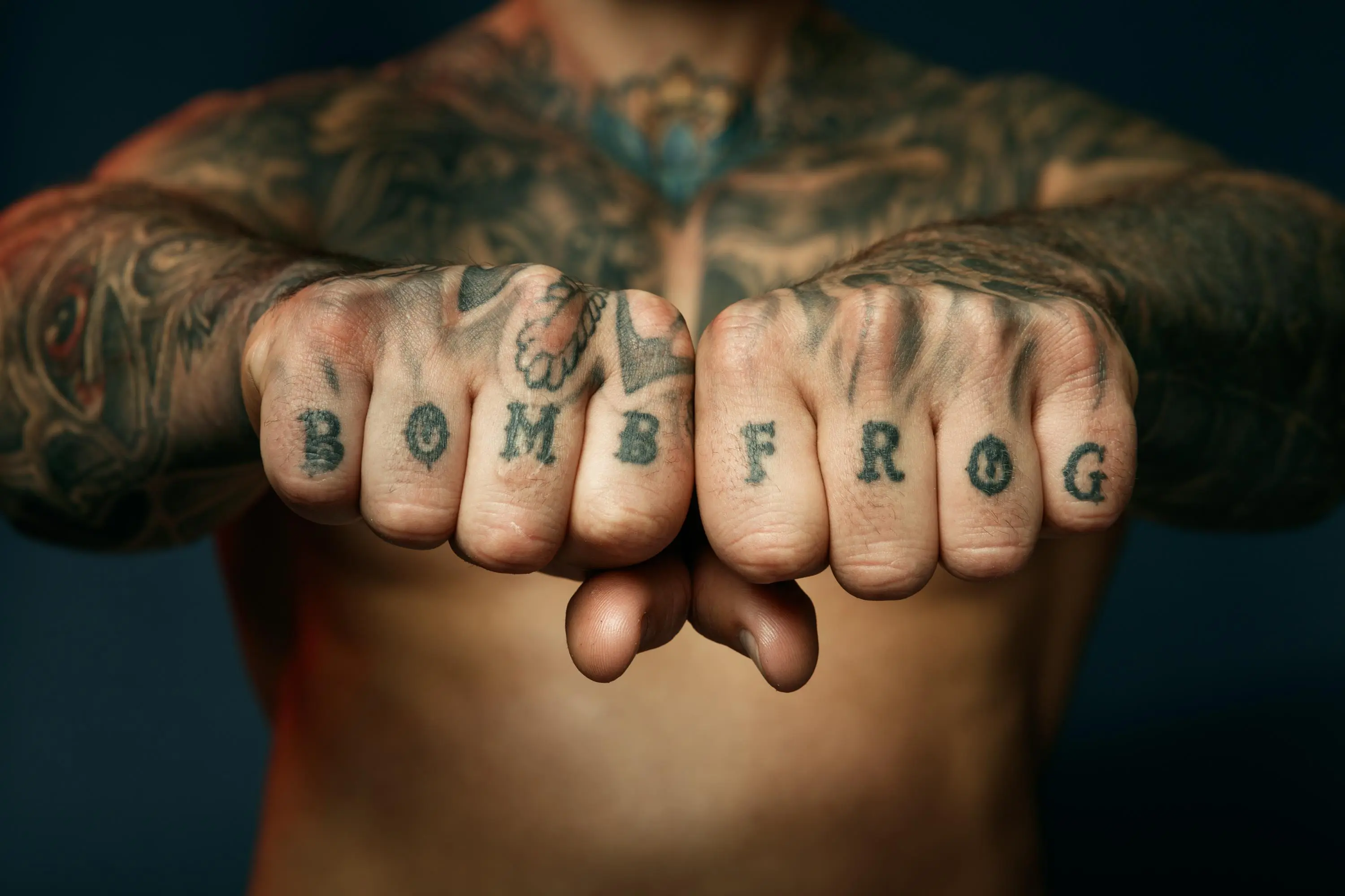 Michael Bell knuckle tattoos