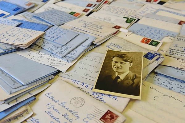 Gilbert Bradley photo with his collection of letters
