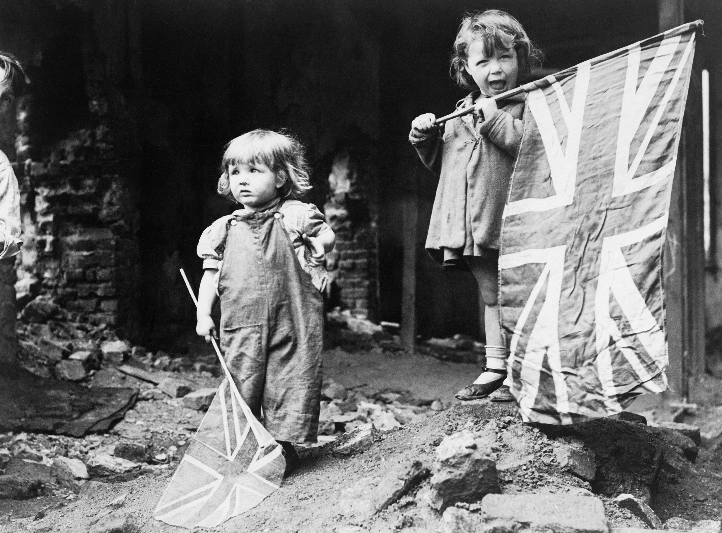 Children waving their flags in London_ 8 MAY 1945_ 1 year licence for Editorial use